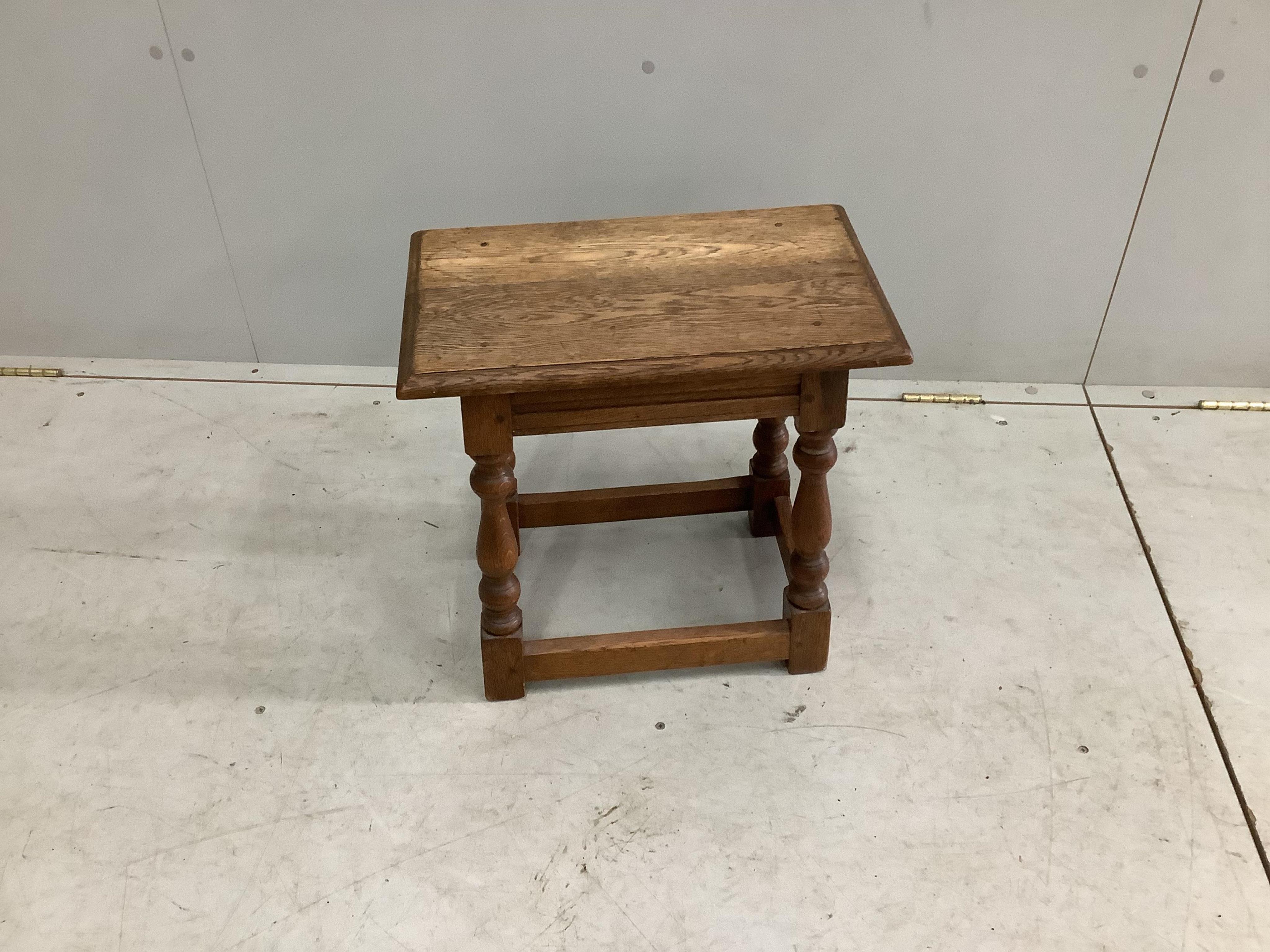 An 18th century style oak joint stool, width 44cm, depth 27cm, height 44cm. Condition - fair